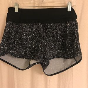 lululemon black-speckled work out shorts.
